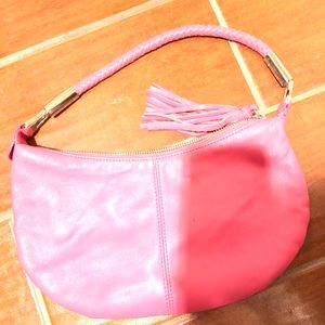 Express pink braided handle bag with tassel zipper